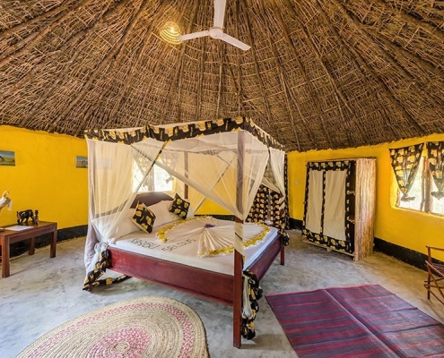 A photo of the interior of one the 49m² Banda Bungalow in Africa Safari Selous Lodge (Nyerere National Park)